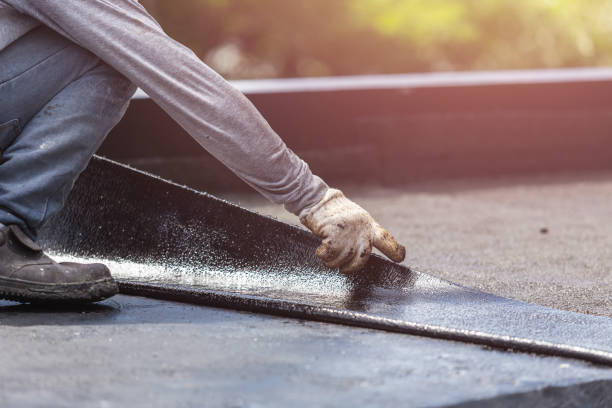 Professional Basement Waterproofing technician working in Sassamansville, PA